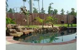 Why Add a Rock Waterfall to Your Pool?