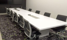 Which material is best for an office conference table?