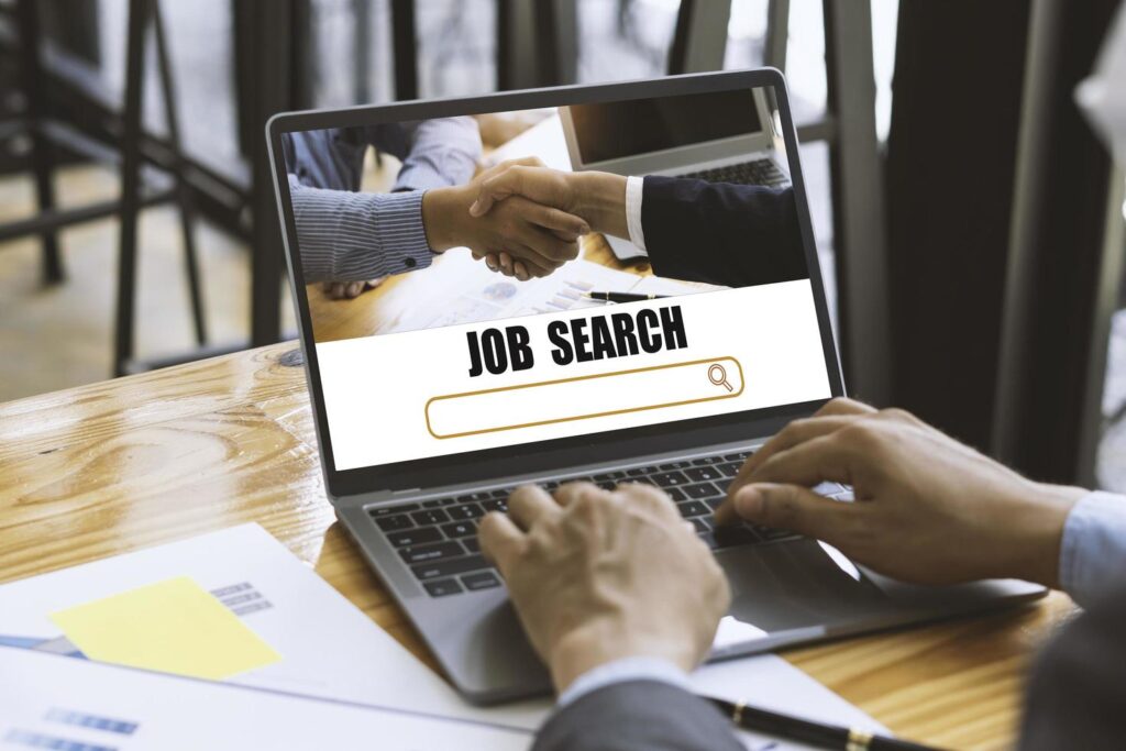 job-search-concept-find-your-career-business-man-looking-at-online-website-free-photo