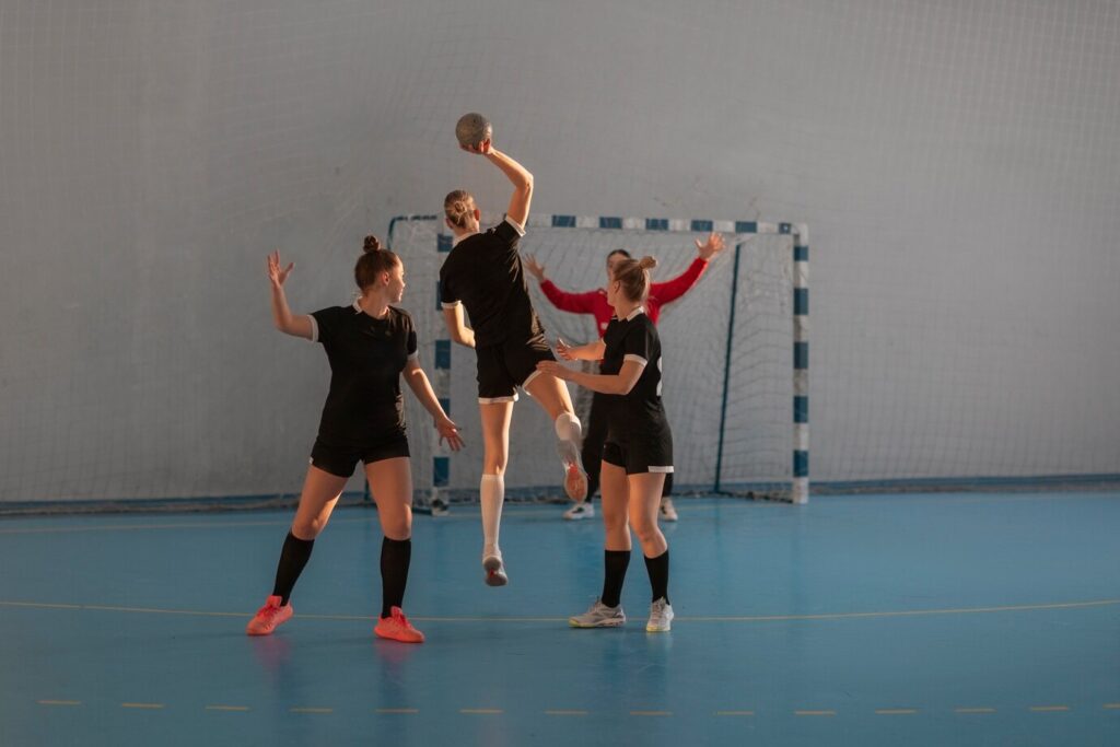 view-handball-players-court_23-2151083971