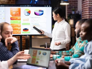 asian-manager-discussing-business-analytics-with-team1