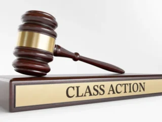 imgi_37_class-action-judges-gavel-as-symbol-legal-system-wooden-stand-with-text-word-1024×576-1