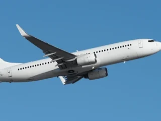 airplane-take-off-on-blue-600nw-2662643431-2